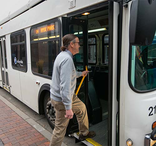 Man Getting on Bus in Downtown Boise